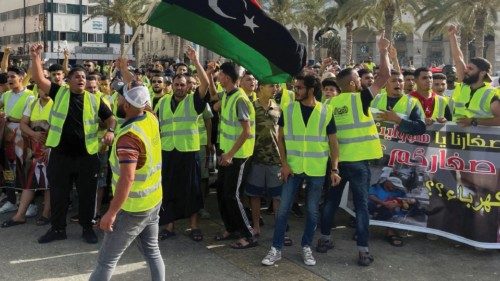 People protest against a power outage inside Martyrs' Square, in Tripoli, Libya  July 1, 2022. ...