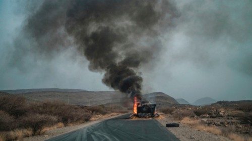 TOPSHOT - A truck, carrying grains to Tigray and belonging to the World Food Programme (WFP), burns ... TOPSHOT - A truck, carrying grains to Tigray and belonging to the World Food Programme (WFP), burns ...