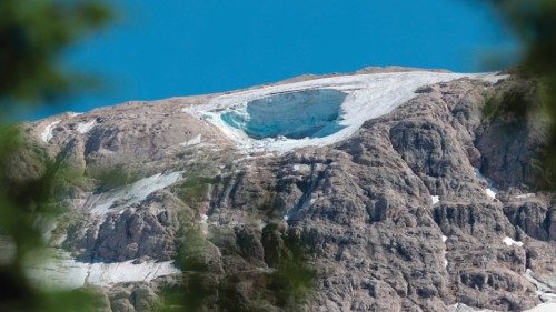 This photograph taken on July 4, 2022 from Canazei, shows the ice serac that collapsed on the ...