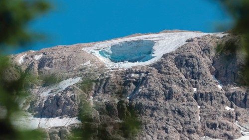 This photograph taken on July 4, 2022 from Canazei, shows the ice serac that collapsed on the ... This photograph taken on July 4, 2022 from Canazei, shows the ice serac that collapsed on the ...