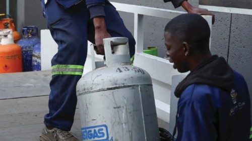 Workers load liquefied petroleum gas (LPG) cylinders, as locals resort to using it as a backup ... Workers load liquefied petroleum gas (LPG) cylinders, as locals resort to using it as a backup ...
