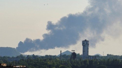 Smoke rises after shelling during Ukraine-Russia conflict in Donetsk, Ukraine July 6, 2022.  ...