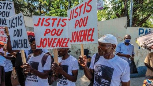 (FILES) In this file photo taken on October 06, 2021 a group of activists demands justice for former ... (FILES) In this file photo taken on October 06, 2021 a group of activists demands justice for former ...