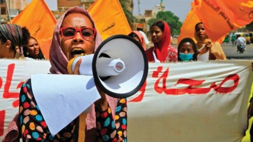 Sudanese women take to the streets of the capital Khartoum, as they join the ongoing protests ...