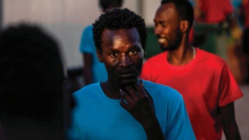 A Soudanese migrant is pictured in the temporary centre for immigrants and asylum seekers in the ...