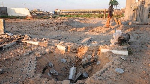 A general view of the destruction following an Israeli airstrike in Gaza city on July 16, 2022. ...