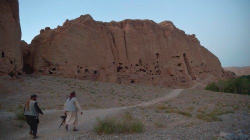 In this picture taken on July 13, 2022, Taliban fighters patrol at the site where the Shahmama ...