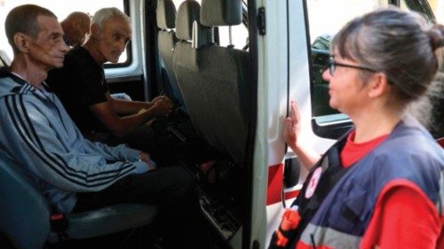 Pensioners with heavy diseases from different settlements located close to the front line, arrive to ...