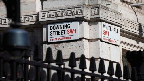 A photograph taken on July 18, 2022 shows the street sign for Downing Street, in central London. - ...