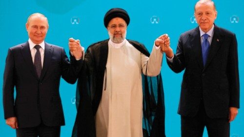 TOPSHOT - (L-R) Russian President Vladimir Putin, Iranian President Ebrahim Raisi and Turkish ... TOPSHOT - (L-R) Russian President Vladimir Putin, Iranian President Ebrahim Raisi and Turkish ...