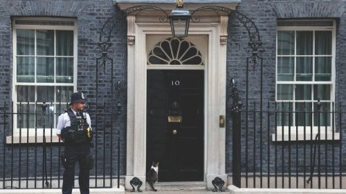 Larry the Cat and a police officer stand outside Number 10 Downing Street in London on July 21, ... Larry the Cat and a police officer stand outside Number 10 Downing Street in London on July 21, ...