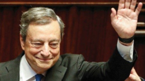 Italy's Prime Minister Mario Draghi waves as he leaves after addressing the lower house of ...