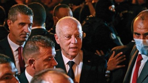 President Kais Saied celebrates with his supporters on Habib Bourguiba Avenue in the capital Tunis ...