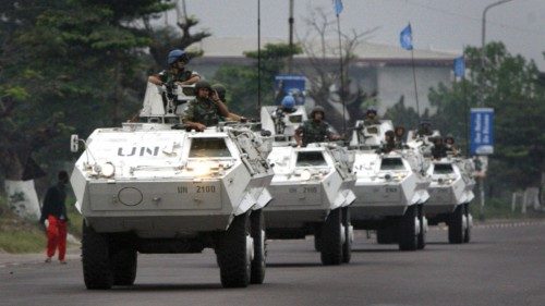 FILE PHOTO: United Nations peacekeeping troops patrol the streets in armoured personnel carriers on ... FILE PHOTO: United Nations peacekeeping troops patrol the streets in armoured personnel carriers on ...