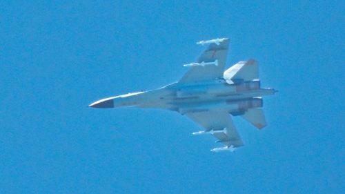 A Chinese military jet flies over Pingtan island, one of mainland China's closest point from Taiwan, ...