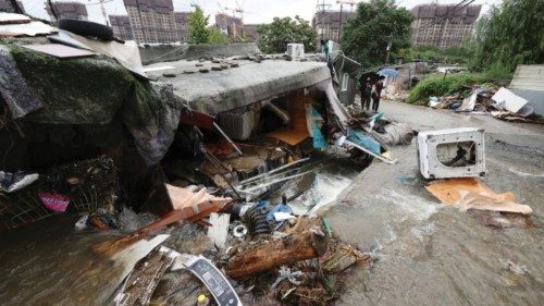 A shack damaged by torrential rain of the previous day is seen at a shanty area in Seoul, South ...