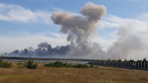 Smoke rises after explosions were heard from the direction of a Russian military airbase near ...
