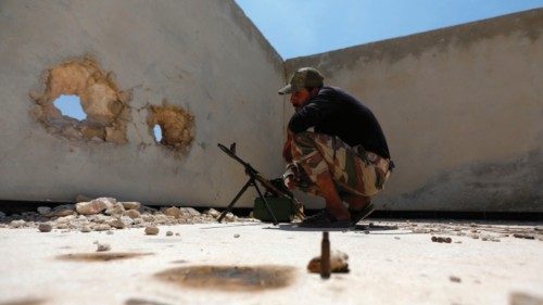 A Turkey-backed Syrian fighter is pictured at a military position on the outskirts of the town of ...