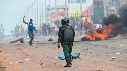 (FILES) In this file photo taken on July 28, 2022 A police officer looks on as protesters block ... (FILES) In this file photo taken on July 28, 2022 A police officer looks on as protesters block ...