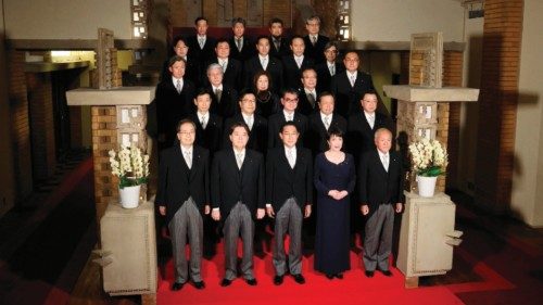 Japan's Prime Minister Fumio Kishida (front C) and his cabinet ministers attend a photo session at ...