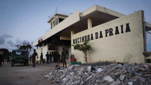 Rwanda soldiers patrol in front of what remains of the airport in Mocimboa da Praia on September 22, ...