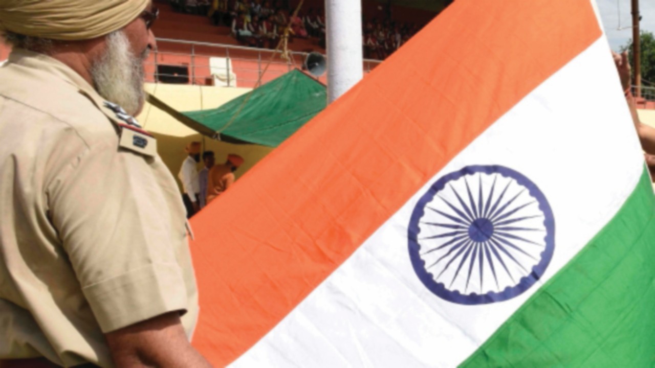 Punjab Police personnel practice hoisting the Indian national flag for and Independence Day ceremony ...