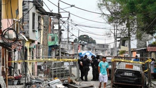 TOPSHOT - Members of the National Police guard the site of an explosion in Cristo del Consuelo ...