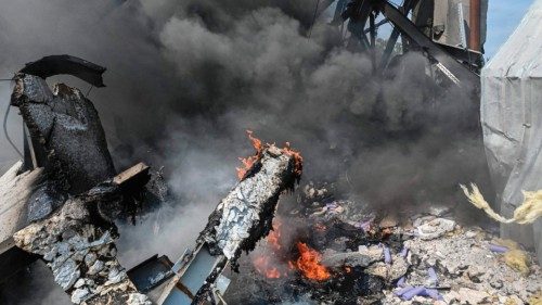 This photograph taken on August 19, 2022 shows a burning building of a chemical factory destroyed ... This photograph taken on August 19, 2022 shows a burning building of a chemical factory destroyed ...