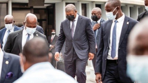 Angola's President Joao Lourenco (C) walks out of a meeting at the People?s Movement for the ...
