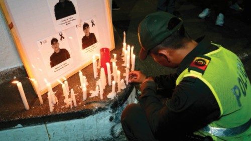 A Colombian police officer takes part in a tribute at the Metropolitan Police in Neiva on September ... A Colombian police officer takes part in a tribute at the Metropolitan Police in Neiva on September ...