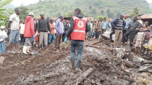 Red Cross members work after a landslide, in Kasese, Uganda, September 7, 2022. Ugandan Red Cross ...