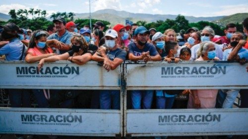 (FILES) In this file photo taken on May 29, 2022 Colombians try to cross from Venezuela to vote in ...