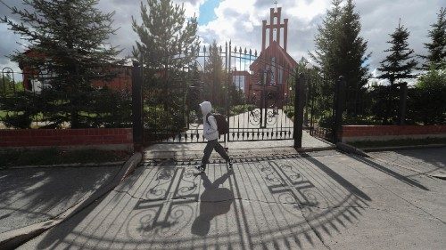 A pedestrian walks past the Catholic cathedral ahead of the 7th Congress of Leaders of World and ...