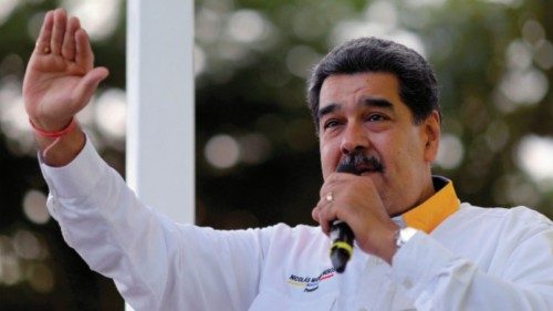 Handout picture released by the Venezuelan Presidency showing Venezuelan President Nicolas Maduro ...