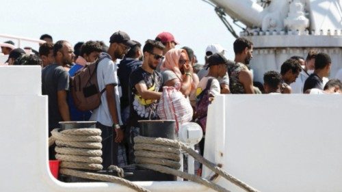 Italian coast guard vessel Dattilo transferring migrants from the overcrowded migrant centre of ... Italian coast guard vessel Dattilo transferring migrants from the overcrowded migrant centre of ...