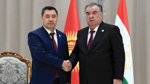 FILE PHOTO: Kyrgyz President Sadyr Japarov shakes hands with Tajik President Emomali Rakhmon during ...