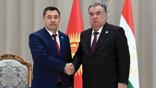 FILE PHOTO: Kyrgyz President Sadyr Japarov shakes hands with Tajik President Emomali Rakhmon during ... FILE PHOTO: Kyrgyz President Sadyr Japarov shakes hands with Tajik President Emomali Rakhmon during ...