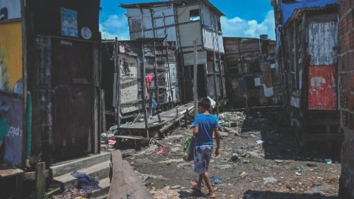 A child walks through the Roque Um favela in Recife, Pernambuco, northeast of Brazil, on September ...