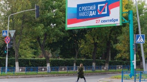 epa10199036 A referendum billboard 'With Russia forever. 27 Sepetmber' during a campaign rally for a ...