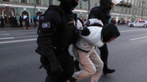 epa10203919 Russian policemen detain a person taking part in an unauthorized protest against ...