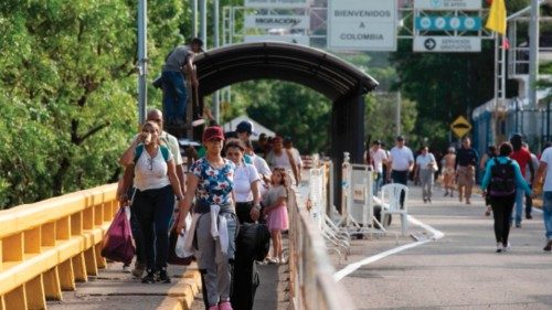 epa10206649 Venezuelan people transit on the Francisco de Paula Santander International Bridge in ...