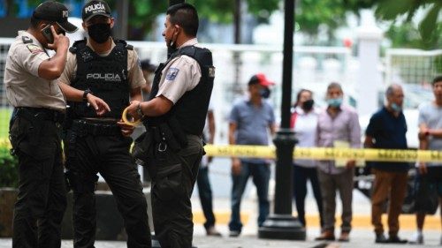 Police work at the crime scene of the murder of Ecuadorean prosecutor Edgar Escobar in front of the ...