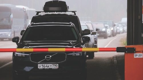 Vehicles coming from Russia queue at the Vaalimaa check point, Finland, on the border with the ...