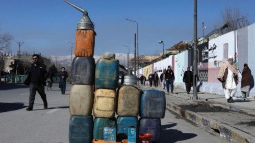 FILE PHOTO: Cans containing gasoline are kept for sale on a road in Kabul, Afghanistan, January 27, ...