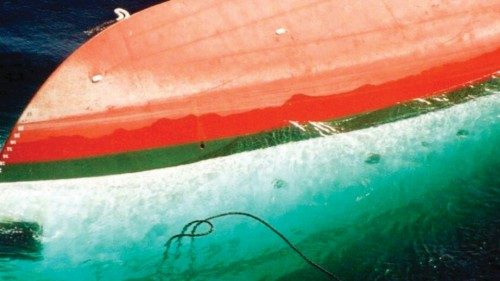 An aerial shot taken 27 September 2002 shows a passenger ferry, the Joola (C), capsized off the ... An aerial shot taken 27 September 2002 shows a passenger ferry, the Joola (C), capsized off the ...