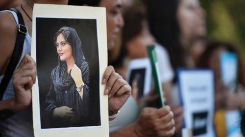 epa10219773 A Lebanese activist holds a poster depicting deceased Mahsa Amini during a protest ... epa10219773 A Lebanese activist holds a poster depicting deceased Mahsa Amini during a protest ...
