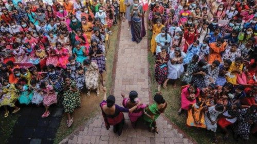 epa10215393 School teachers perform a dance during the Children's Day program at a girls' school in ...