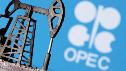 FILE PHOTO: A 3D-printed oil pump jack is seen in front of displayed OPEC logo in this illustration ...