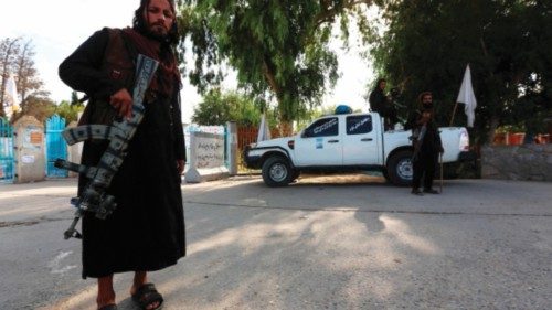 Taliban security forces stand guard along a roadside in Jalalabad on October 6, 2022. (Photo by AFP) ...