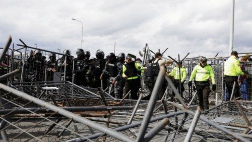 FILE PHOTO: Police organize fallen fences after relatives of inmates clashed with police while ... FILE PHOTO: Police organize fallen fences after relatives of inmates clashed with police while ...